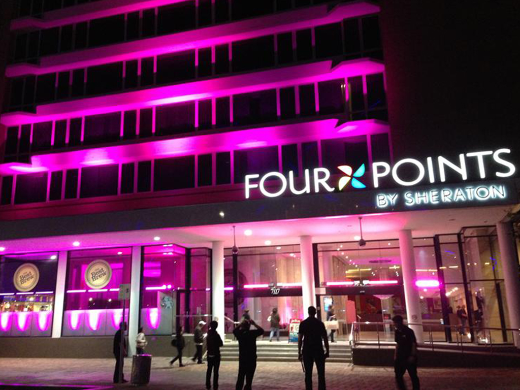 Entrance to four points by sheraton building at night